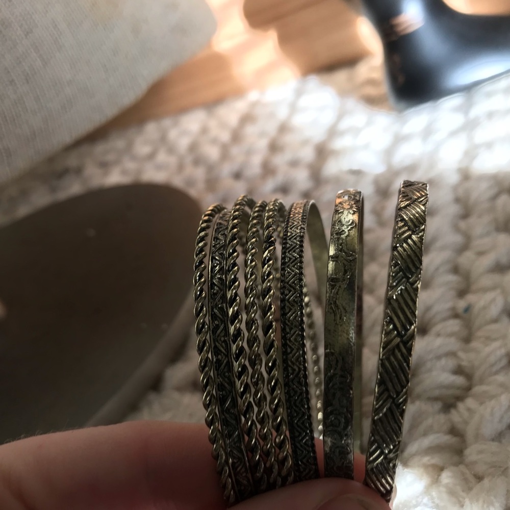 Set of gold bracelets.